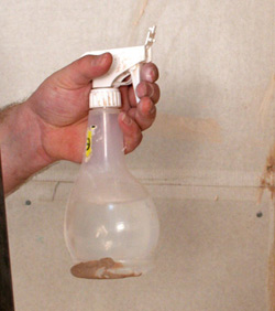 plastering top tips 2 - use a spray bottle to apply water to the plaster